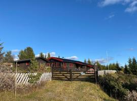 Kimsbu - cozy mountain cabin in hiking area, vakantiehuis in Nes