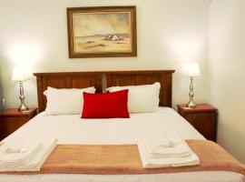 Accommodation at Potch Guesthouse، فندق بالقرب من محمية أو بي إم بروزيسكي للطيور، بوتشيفستروم