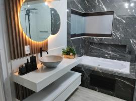 Suíte Máster Luxo - Lar-Doce-Mar, ξενοδοχείο σε Barra Velha