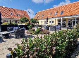 Toftegården Guesthouse - Apartments & Rooms – pensjonat w mieście Skagen