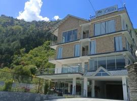 Gezellig Inn - Hotel Oasis, hotel i Kullu