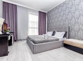 Светлая Однокомнатная квартира в ЖК Promenade Expo, hotel in Prigorodnyy
