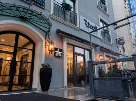 Port Rivoli Baku Luxury Boutique Hotel، فندق في Nasimi، باكو