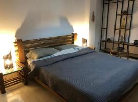 Superbe chambre dans un appartement à partager, homestay in El Aouina