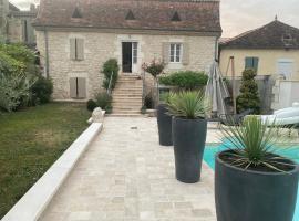 Le relais de l’ancienne poste, B&B/chambre d'hôtes à Sigoulès