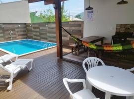 Casa com piscina em Zimbros, casa rústica em Bombinhas