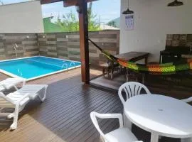 Casa com piscina em Zimbros