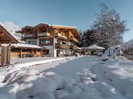 Flora - Das kleine Gartenhotel, hotel in Ellmau