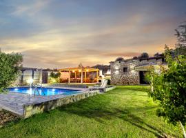 Memi Beach front Villa, hotel i Kiotari