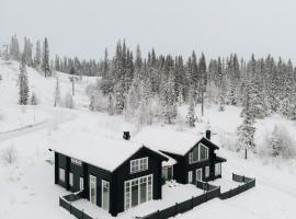 Åre Valley Lodges - Grand Ski Lodge, casa de campo em Åre