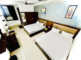 The Boston Rooms, hotel en Tajganj, Agra