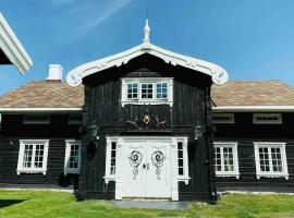 Eventyrlig Tømmerhytte på Gårdstun, villa in Vinstra