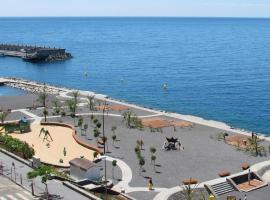 Un lujoso duplex en Radazul en primera linea de playa y con parking propio, hotel em Radazul