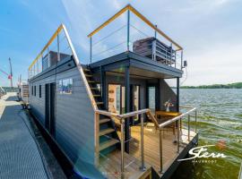 Hausboot Glücksmomente mit Dachterrasse in Schleswig am Ostseefjord Schlei, hotel in Schleswig