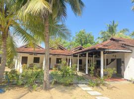 Harmony Beach Hotel, kotimajoitus Arugamissa