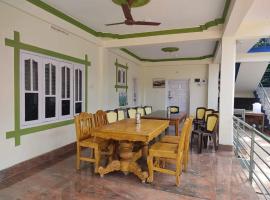 New Royal Sundaram Homestay, hotelli kohteessa Madikeri