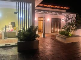 Guruge Home Stay, hotel i Ambalantota