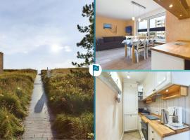 Ferienwohnung Uske，威克奧夫弗爾的附設泳池的飯店