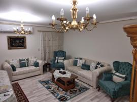 TBK1 apartment in Alrehab city for families only, parkolóval rendelkező hotel Burg el-Ḥudûd városában