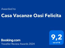 Casa Vacanze Oasi Felicita，海濱新錫里的度假住所