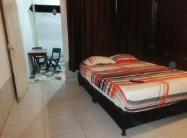 Casa de relajación low cost, bed and breakfast en La Dorada