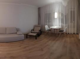Przytulny, spokojny, wyposażony apartament โรงแรมใกล้ King Cross Marcelin ในพอซนาน