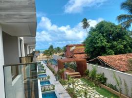 APTO 107-Pé na Areia Praia do Maceio - 2 suites, 2 banheiros+SPA Jacuzzi+Roupas de cama, hotel em São Miguel do Gostoso