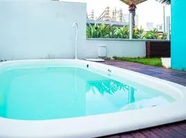 Praia e Piscina em Palmas do Arvoredo