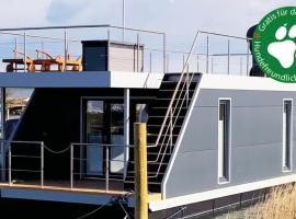 Hausboot Moby Chic mit Dachterrasse in Kragenæs auf Lolland/DK, båd i Torrig