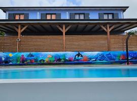 LES GITES D'ANGELE- G&icirc;tes calme avec piscine, vue sur mer & jardin tropical