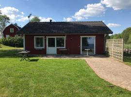 Stuga i Lillaryd med fantastiskt utsikt., villa en Bredaryd