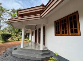Puthenveettil, cabaña o casa de campo en Kottayam