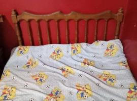 Weza, hotel con estacionamiento en Ash Shaghānibah