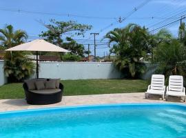 M&M House - Casa com Piscina e Ar Condicionado em Matinhos, hotel u gradu Matinjos