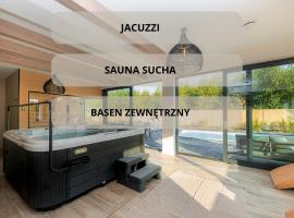 Mielnovo - dom z basenem, sauną i jacuzzi – domek wiejski w mieście Mielno