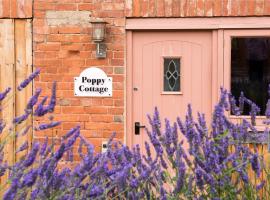 Poppy Cottage - Great Houndbeare Farm Holiday Cottages، فندق في Aylesbeare