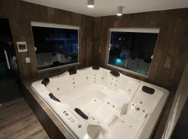 Casa agradável em frente a praia com jacuzzi/spa, hôtel à Niterói