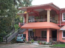 Coorg Stream Side Homestay, familiehotell i Ponnampet