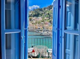 Nikolakis, Seafront- Harbor view, beach hotel in Symi