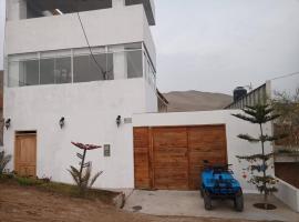 Villa Alfonso - Casa playa con piscina temperada, cabaña o casa de campo en Lima