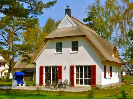 Ferienhaus Inga mit E-Ladestation, hotel in Glowe