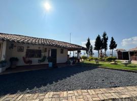 Finca Villa Maria - Cabaña, Ferienunterkunft in Ráquira