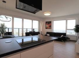 City view from 30. floor, parking price included, apartment in Nivy