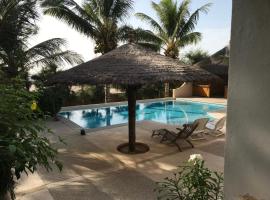 Les Filaos-Case Typique Sénégalaise, strandhotell i Djifère