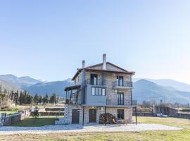 Raise Polydrosos Alpine Escape, hotel s parkiralištem u gradu 'Polydrossos'