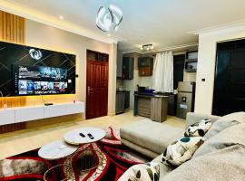 BlackOak Luxury Home B06 1BR Kyanja, hotel que admite mascotas en Kampala