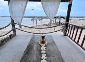 Rumahbatu beach cottage