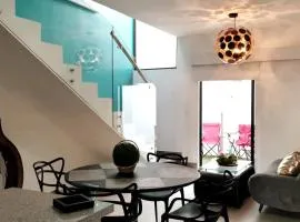 La casa del faro Azul Marino