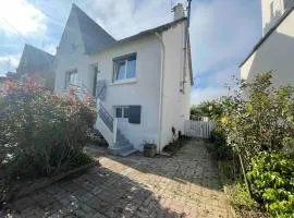 Maison spacieuse avec jardin et salle de sport