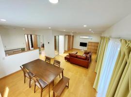 グローカル春日居温泉, pet-friendly hotel in Fuefuki